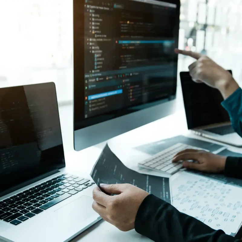 team working development of programming and encryption technology website